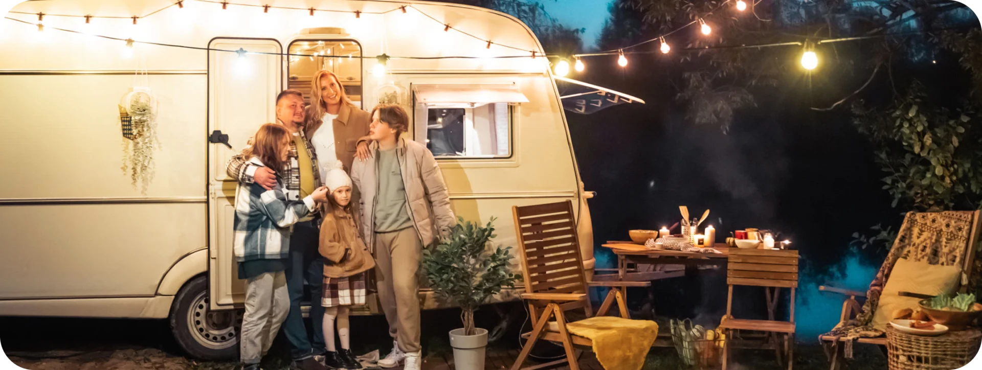 Cozy outdoor gathering with string lights