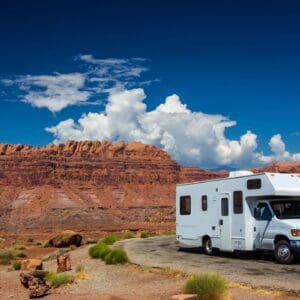 Motorhome traveling through desert scenery