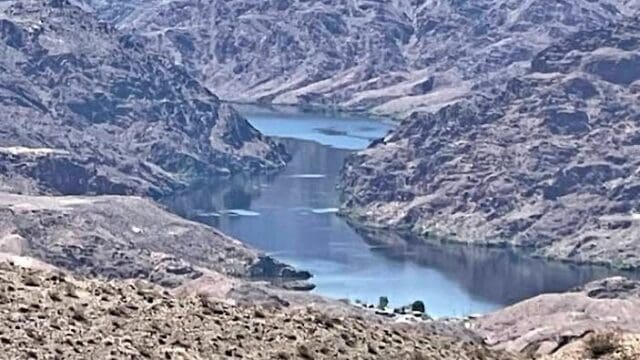 Mountainous landscape with a winding river.