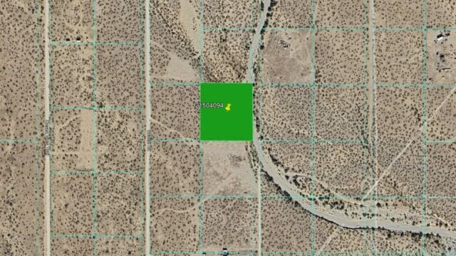 Aerial view of desert land with grid.