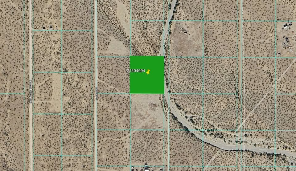 Aerial view of desert land with grid.