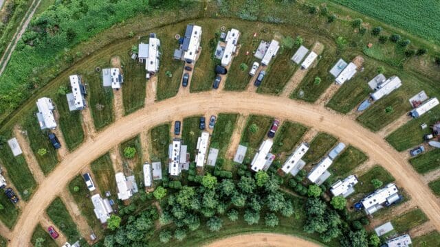 Aerial view of RVs in a campground.